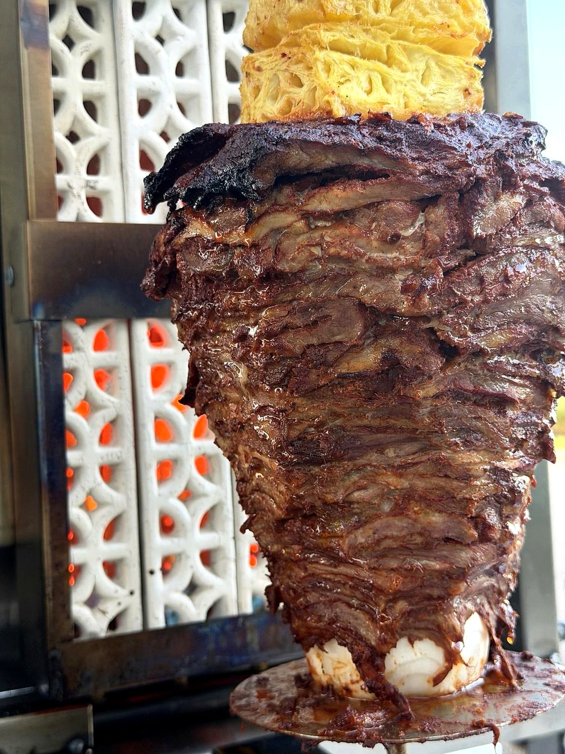 La Ruta chef carving the trompo during live service